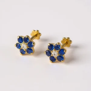 9kt Gold Blue Floral Earstuds. Lightweight, comfortable, and suitable for multiple piercings. Everyday luxury from Cha Cha Jewellers, Bradford.